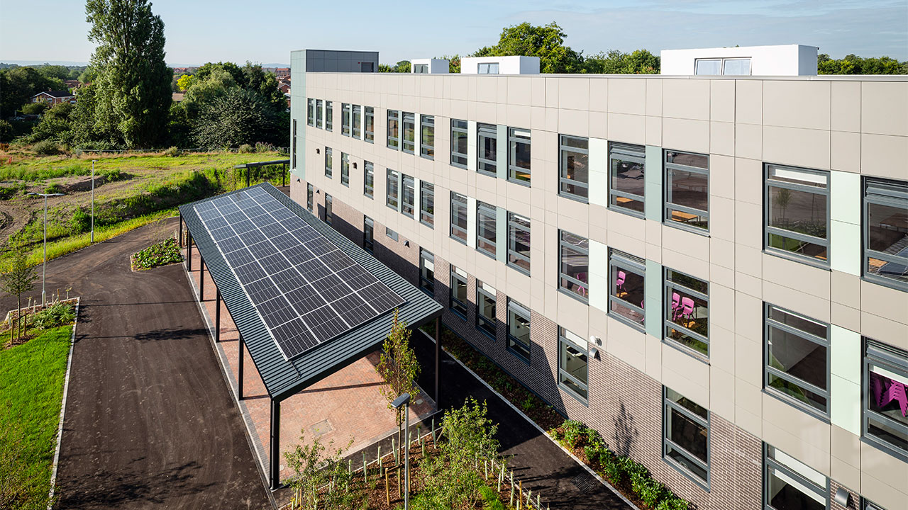 Render image of the outside of a school building