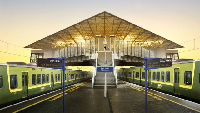 REnder image of a local railway station with two platforms and a train standing at each platform