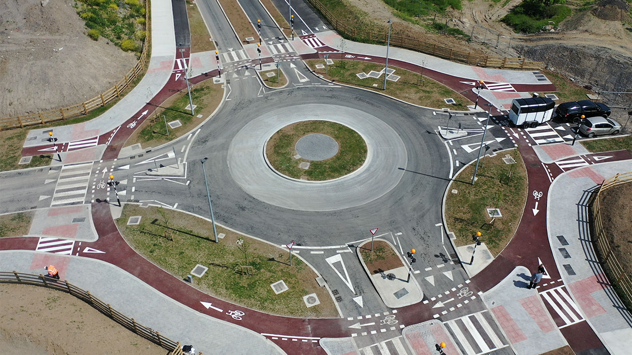 Aerial photograph of a dutch style roundabout supporting traffic, pedestrians and cyclists