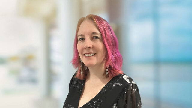 Headshot of Laura Holmes