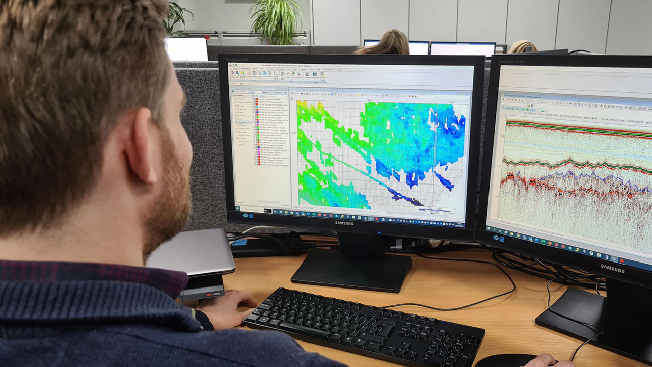 Geoscientist working on interpretation of ultra-high resolution seismic data for an offshore wind farm ground model