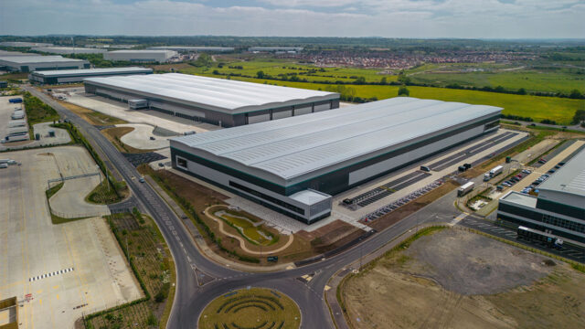 Aerial photograph of an industrial estate conneceted by road