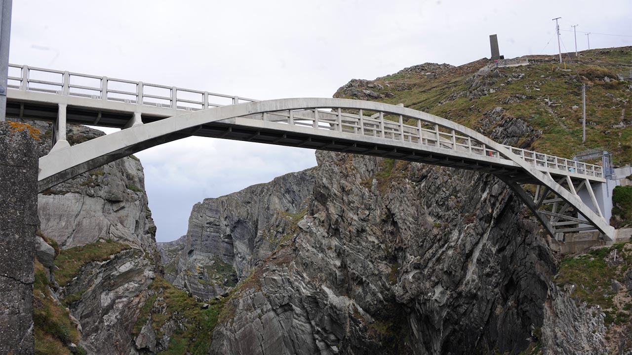 View of Mizen Head Footbridge, from below showing the span across sea cliffs on either side