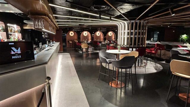 Photo of a modern, energetic VIP lounge at the AO Arena in Manchester