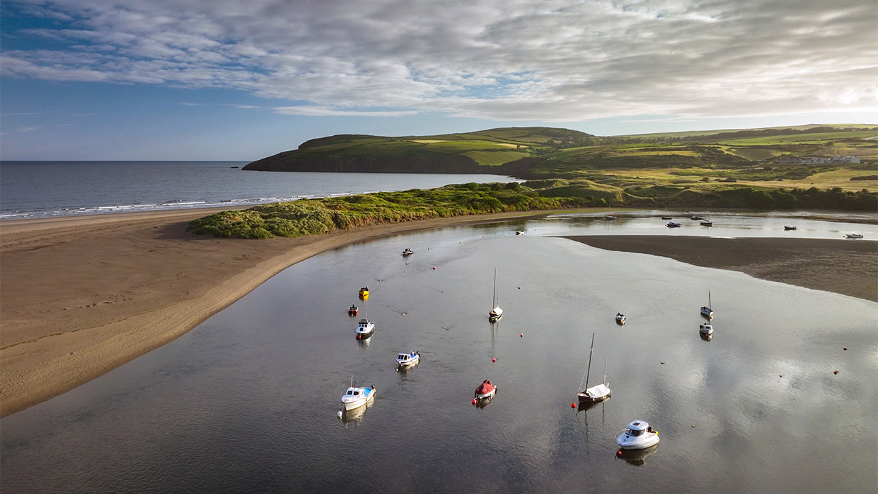 Aerial view of fishing boats moored in a harbour