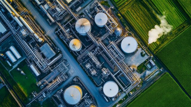 Aerial view of biomass-tanks alongside renewable power station