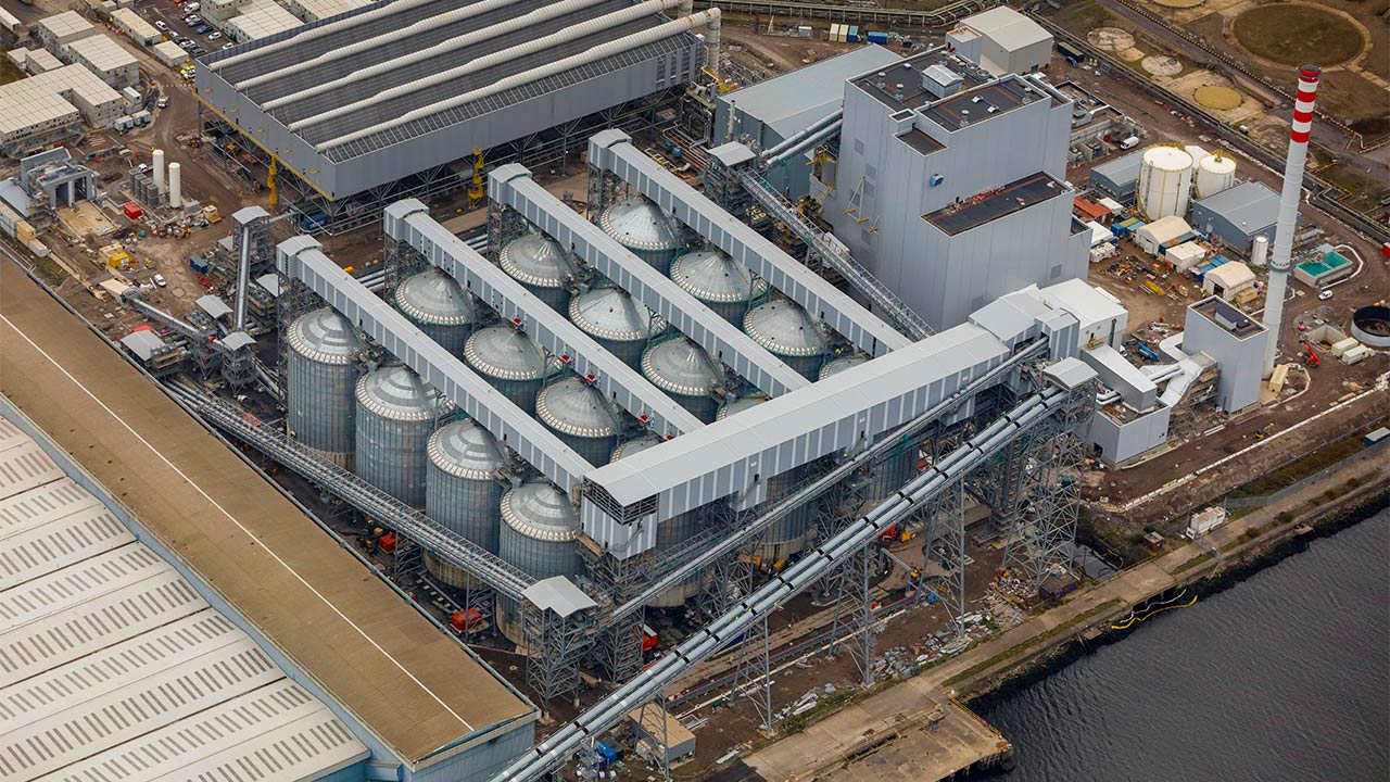 Aerial view of biomass-tanks alongside renewable power station