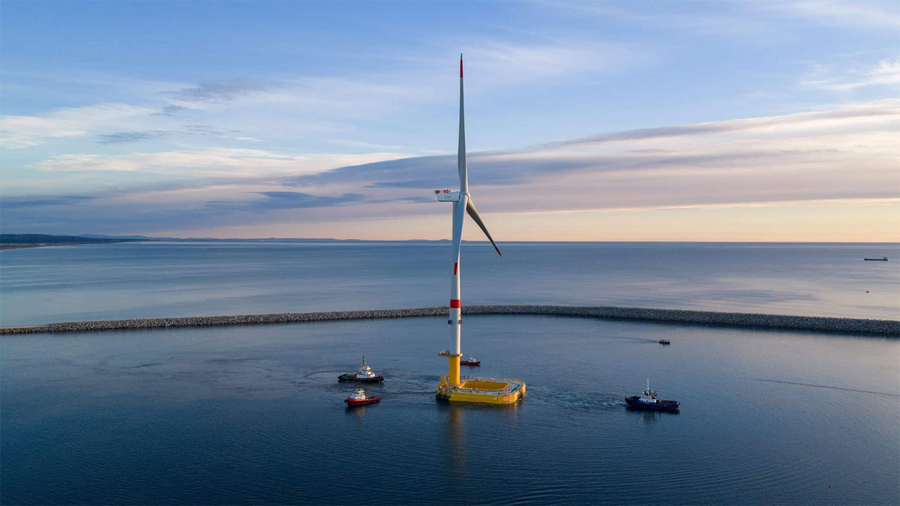 Towing a floating offshore wind turbine