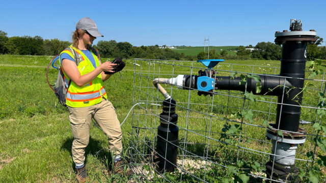 Tetra Tech field staff adjusting a landfill gas well