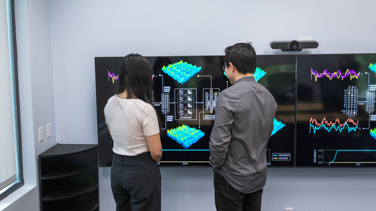 Two people discussing AI