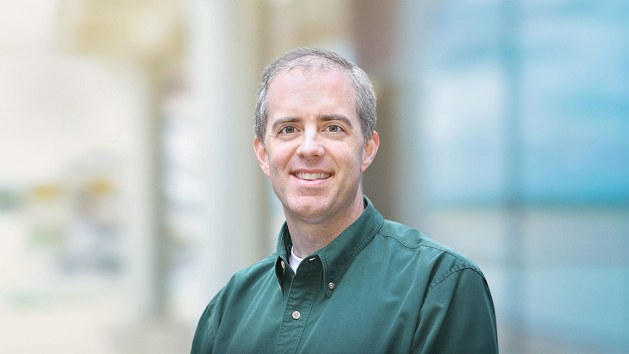 Headshot of John Preston