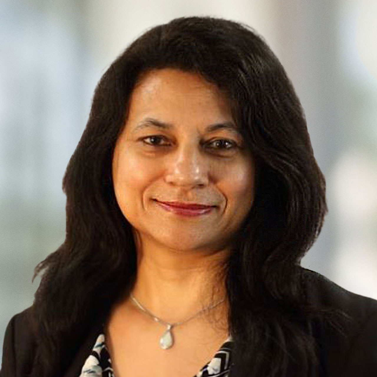 Headshot of Rukhsana Faiz