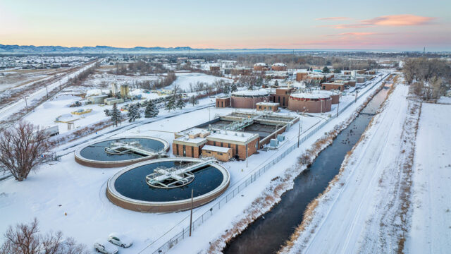 Aerial view of industrial area of Fort Collins, Colorado with a wastewater treatment plant