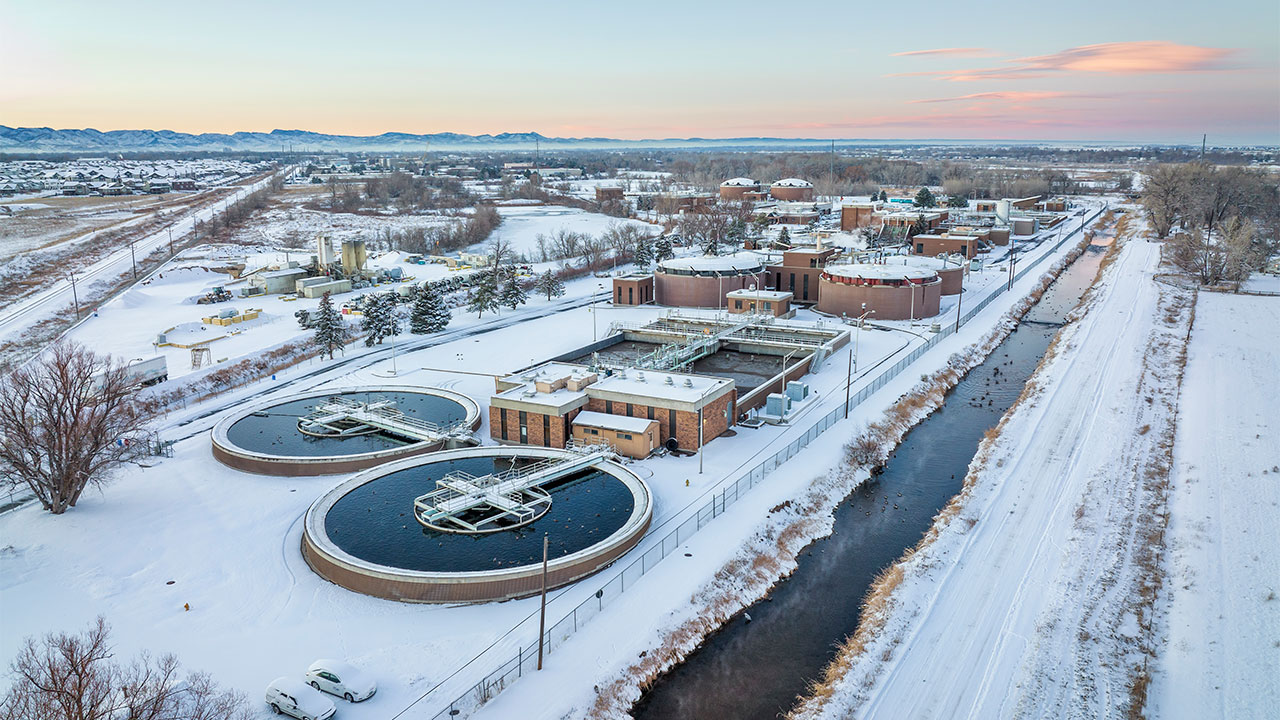 Aerial view of industrial area of Fort Collins, Colorado with a wastewater treatment plant