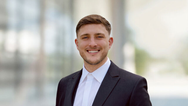 Headshot of Adam Shaw